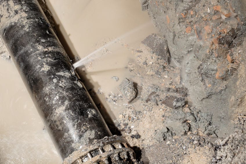 a burst pipe sprays on drywall | cherry hill plumber