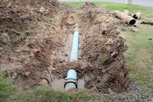 sewer pipe repair in progress in the yard of a New Jersey home